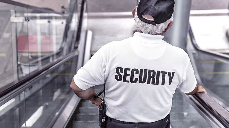Security guard on stairs